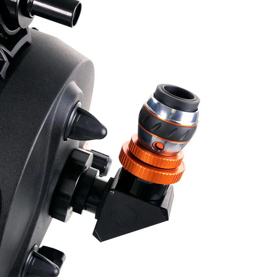 Close-up of a mechanical component with orange and black details on a white background