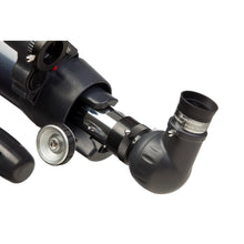 Close-up of a telescope with eyepiece on a white background