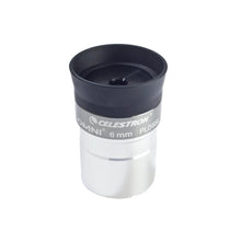 Celestron telescope eyepiece on a white background