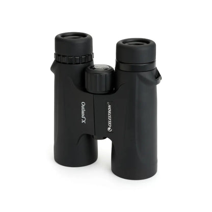Black binoculars with Celestron logo on a white background