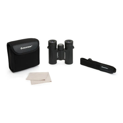 Celestron binoculars with carrying case and cleaning cloth on a white background