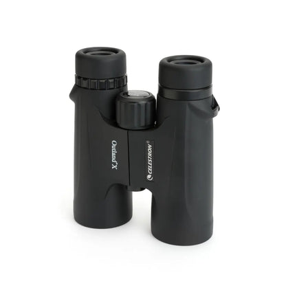 Black binoculars with Celestron branding on a white background