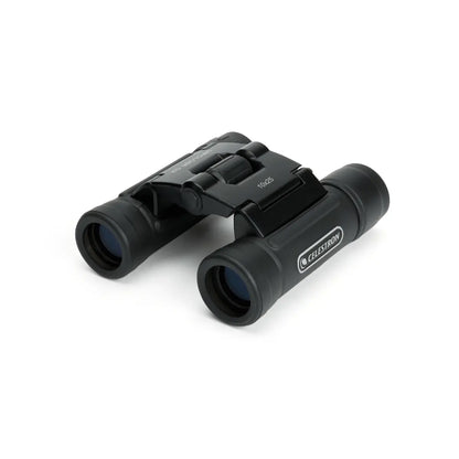 Black Celestron binoculars on a white background