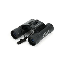 Black Celestron binoculars on a white background