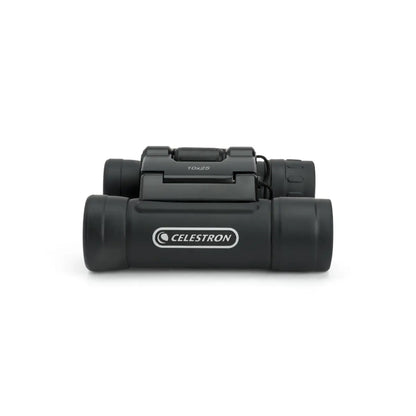 Black Celestron binoculars on a white background