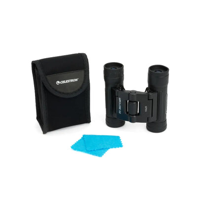 Celestron binoculars with carrying case and cleaning cloth on a white background