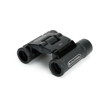 Black Celestron binoculars on a white background