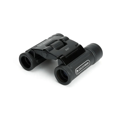 Black Celestron binoculars on a white background