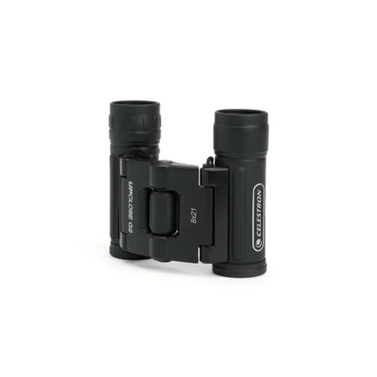 Black Celestron binoculars on a white background