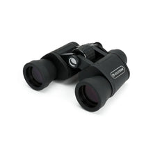 Black Celestron binoculars on a white background