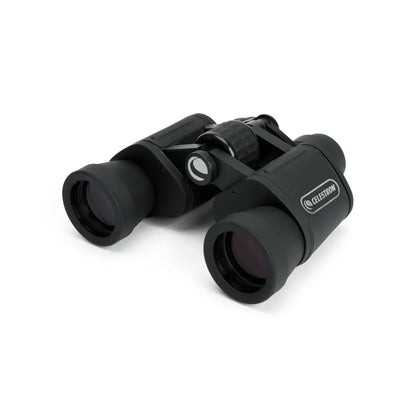 Black Celestron binoculars on a white background