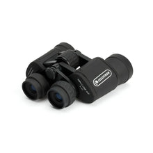 Black Celestron binoculars on a white background