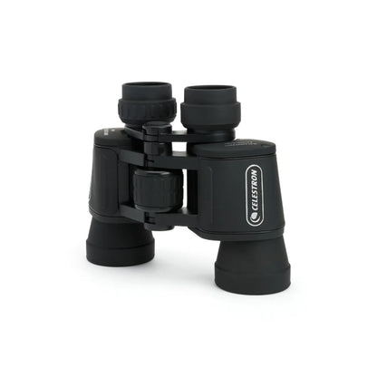 Black Celestron binoculars on a white background