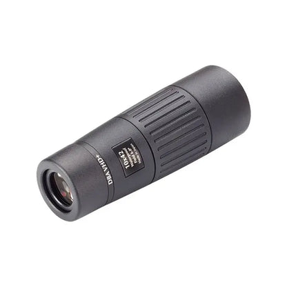 Black monocular telescope on a white background