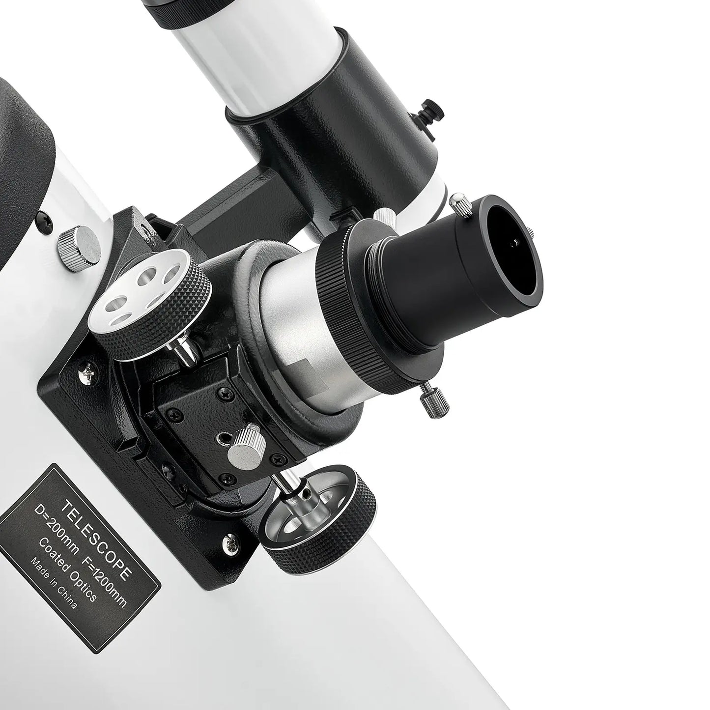 Close-up of a telescope with a white background