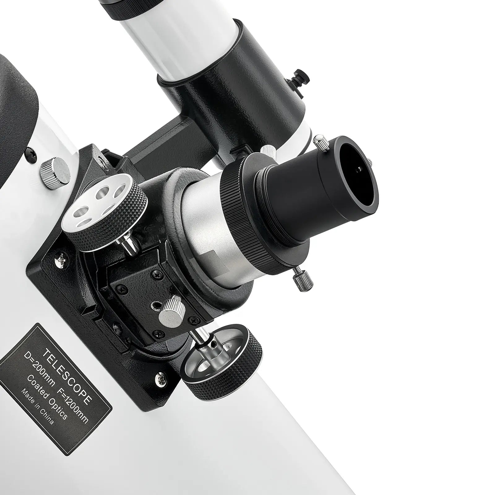 Close-up of a telescope with a white background