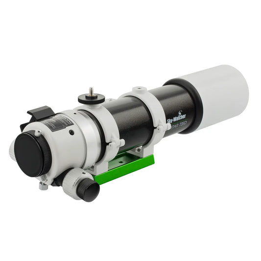 Telescope with black and white design on a white background