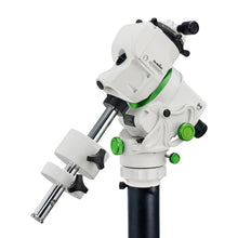 White and green telescope with black accents on a white background