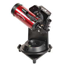 Red and black telescope with 'Maksutov' branding on a white background