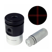 Optical eyepiece with red crosshair reticle on a white background